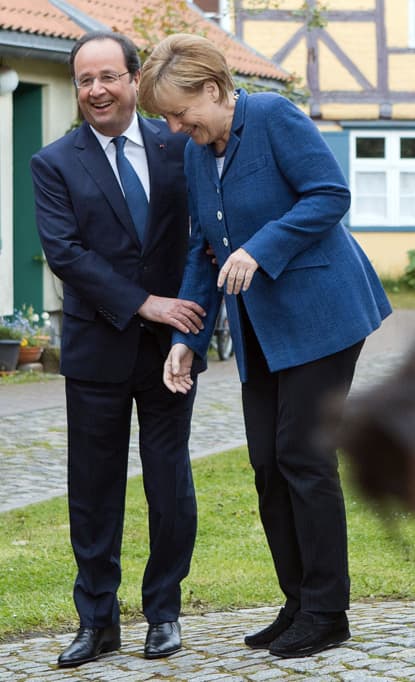 F. Hollande'as ir A. Merkel. Nuotr. EPA-ELTA