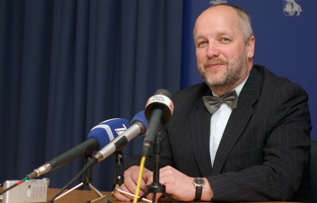 J. Olekas.