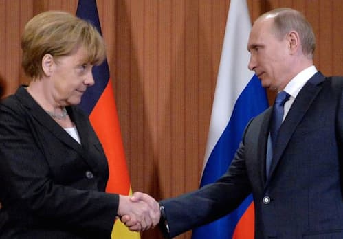 Merkel atšaukė susitikimą su Putinu, bet susitiko su Putinu