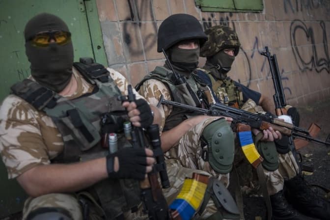 Pabėgėliai kaltina Ukrainos savanorių batalionų kovotojus žvėrišku elgesiu