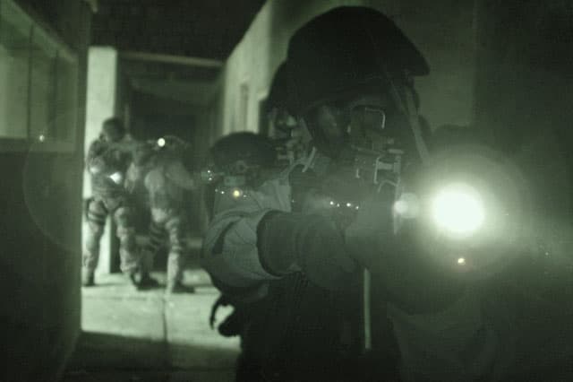 Remigijus Bridikis ėjo NATO specialiųjų operacijų štabo (NSHQ) karininko pareigas. NSHQ pareigūnai veidų nerodo.