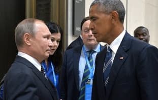 Keliom minutėm susitiko Obama ir Putinas