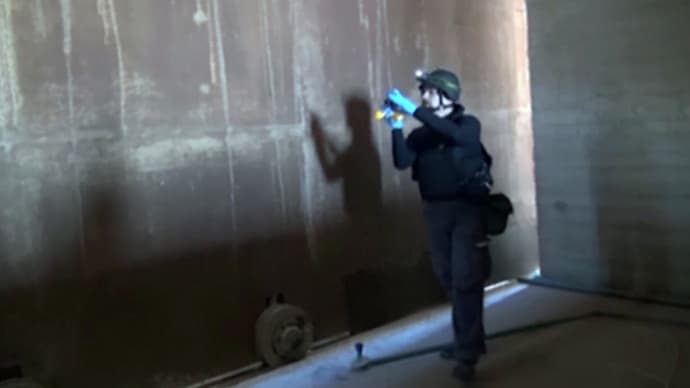 OPCW ekspertas dirba Sirijoje. 2013 m. spalio 10 d.