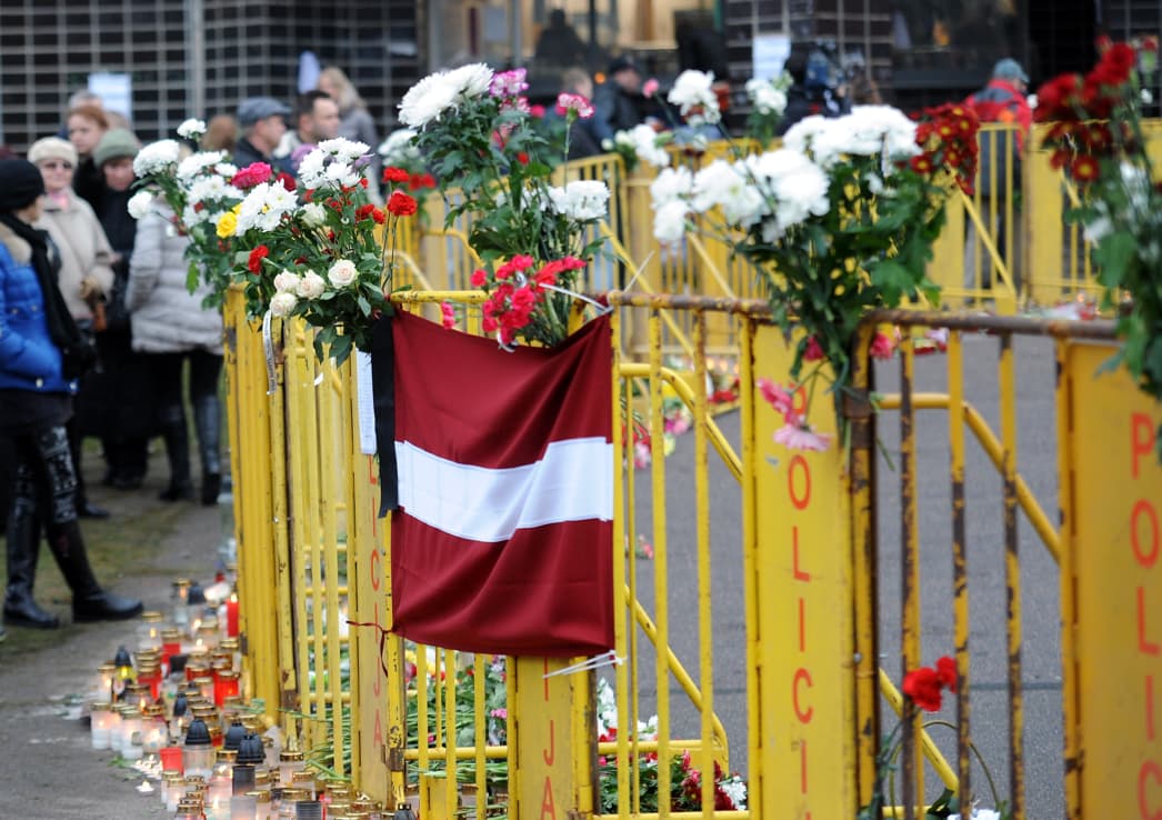 Tragedija Rygoje pasiglemžė 54 žmonių gyvybes. Nuotr. LETA-ELTA