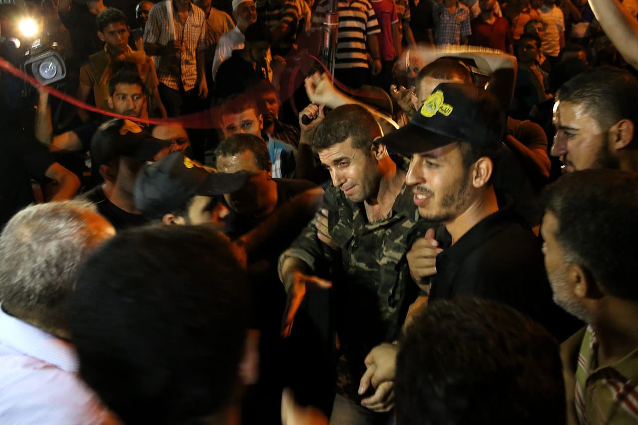 Iš Izraelio kalėjimų paleistus palestiniečius sutiko jų artimieji. EPA-ELTA nuotr.